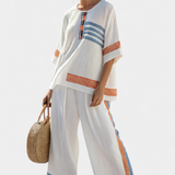 Bílé etnické soupravy Daisy s modrými a oranžovými detaily – jedinečný a živý styl